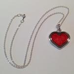 Heart Pendant: Red transparent enamel on silver with gold leaf; Pendant size, 26.5mm high x 26mm wide x 3mm thick.